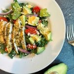 A bowl of Pesto Chicken and Avocado Salad.