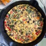 A cast iron filled with a Vegetable Frittata.