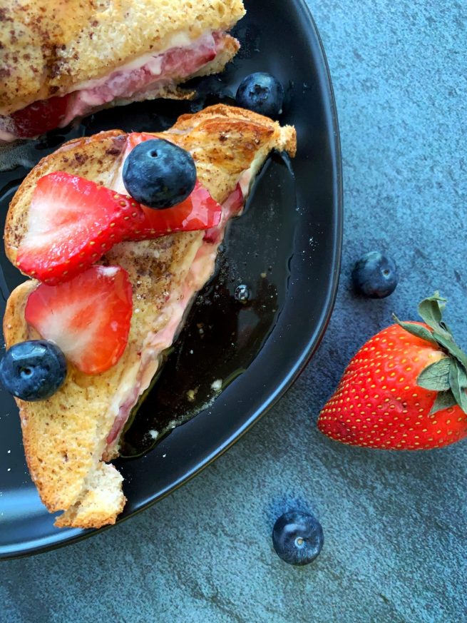 air fried stuffed french toast with strawberries and blueberries
