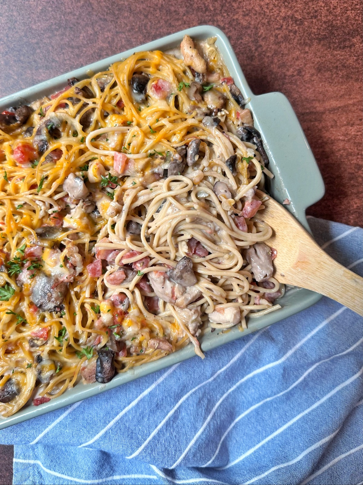 A ceramic baking dish filled with chicken tetrazzini.