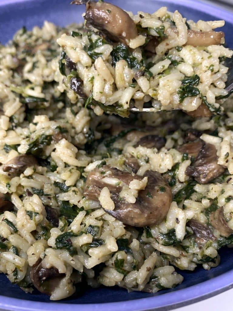 closeup of one-pot creamy mushroom & spinach rice