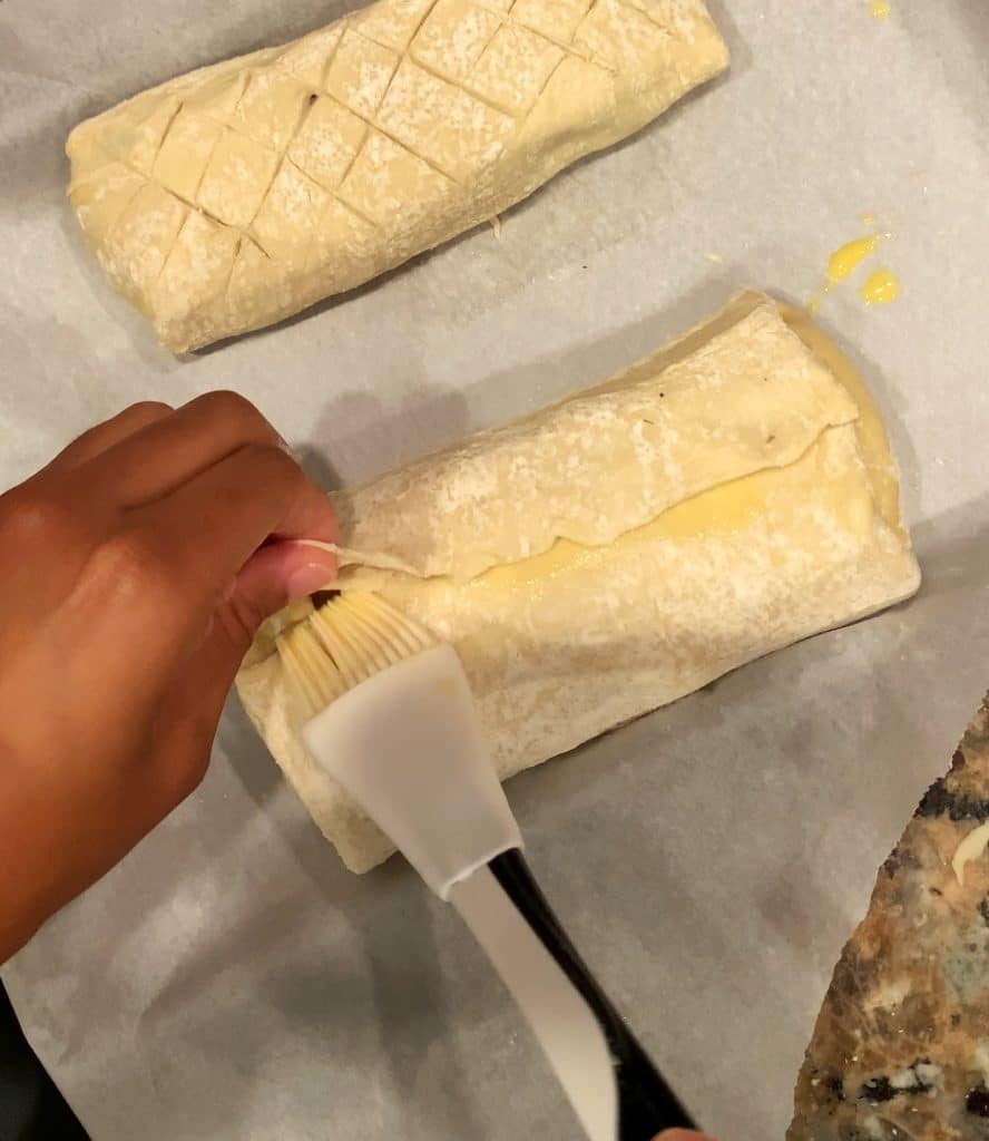 A tutorial showing step 3 of how to fold a Salmon Wellington or Puff Pastry Salmon.