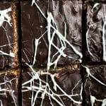 A zoomed in shot of chocolate-covered s'mores flavored Rice Krispie treats.