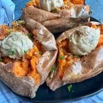 Baked sweet potatoes with plops of chai-spiced butter on top.