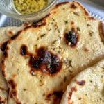 A closeup shot of homemade garlic naan.