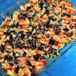 A casserole dish of cold sushi bake with imitation crab.