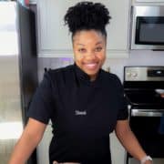 Headshot of Shani, founder of Coined Cuisine