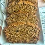 Slices of espresso banana bread on a white serving tray.