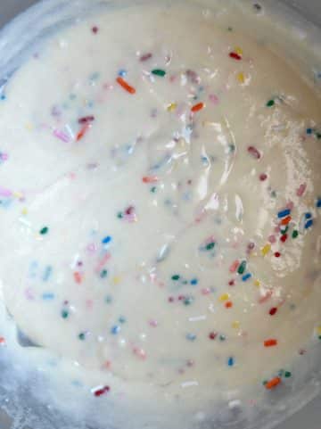 A bowl filled with funfetti cake batter.