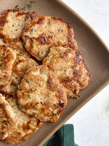 A platter of chicken breakfast sausage patties.