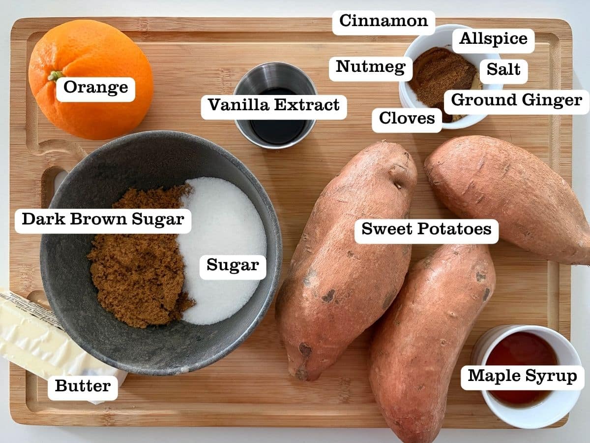 A wooden board with containers of ingredients to make candied sweet potatoes.