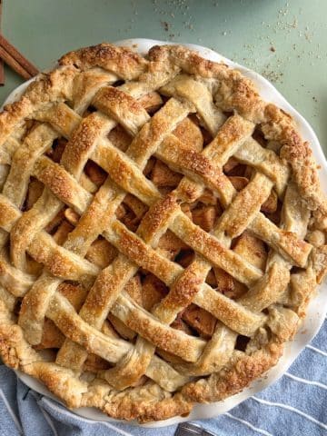 A classic apple pie with a lattice top crust.